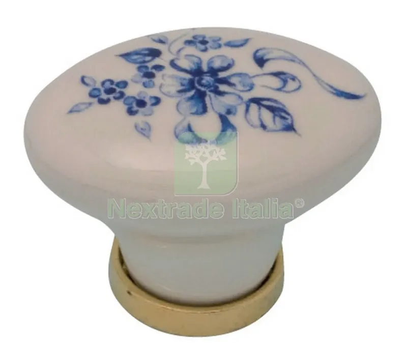 25PZ Pomolo Porcellana Ovale con Base Figura 7 MM.35X25 — Maniglie e pomelli — rif. FERX.37670